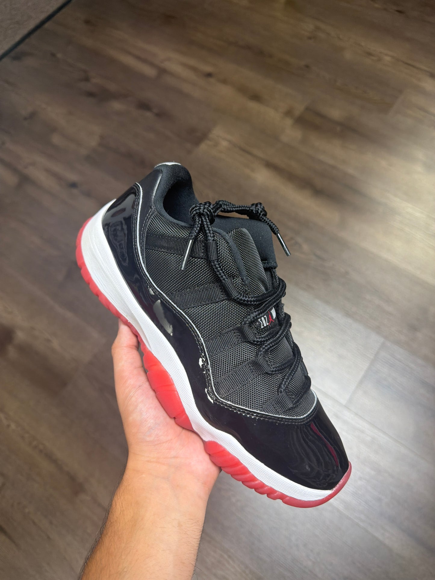 Jordan 11 Low “Bred”