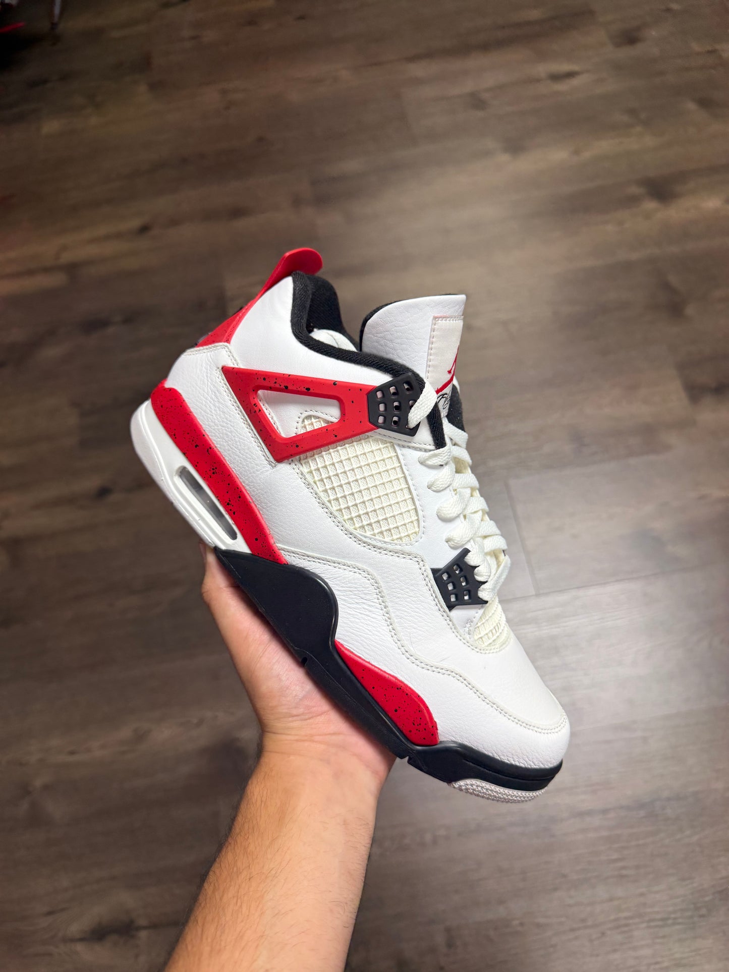 Jordan 4 “Red Cement”