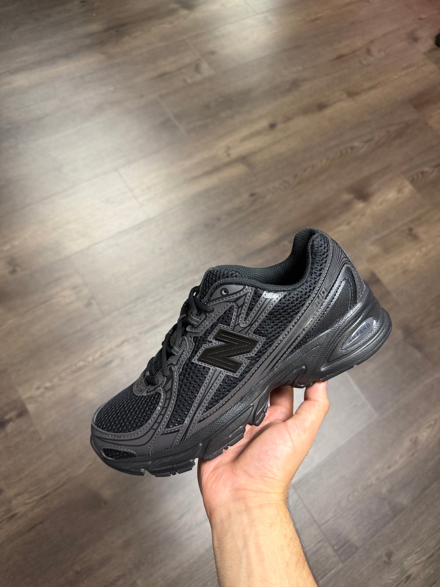 New Balance 740 “Triple Black”